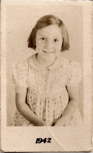 A portrait of Josie Sandoval, around age 7.